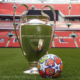 The adidas UCL Pro Ball London alongside the trophy at Wembley Stadium [via UEFA]